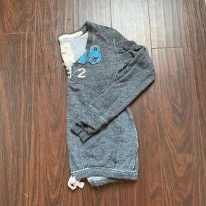 Sweatshirt with tie bottom